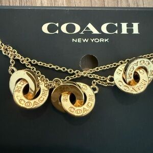 Coach Interlocking Gold Necklace